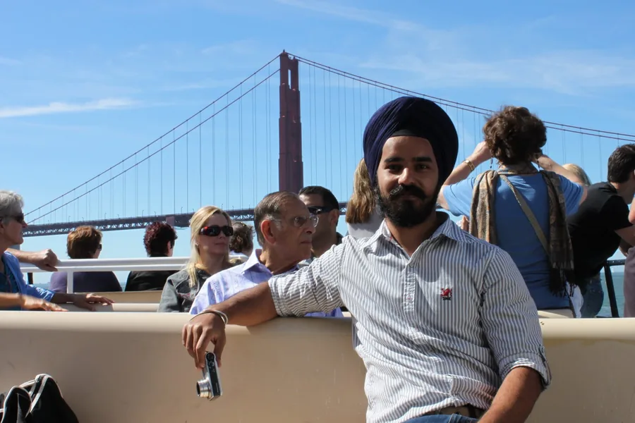Gurmeet in front of the Golden Gate Bridge during the 2011 US visit where the idea for PunjabiCharm was born